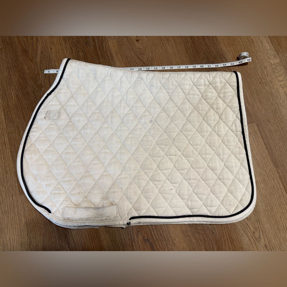 White saddle pad with black trim